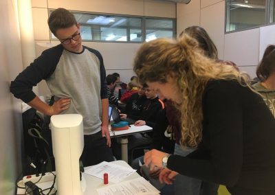 Nanolive live cell imaging microscope: college students working with the 3D Cell Explorer